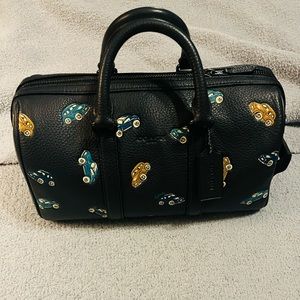 Coach Dark Navy Pebble Leather Handbag with little cars. like NEW! Crossbody too